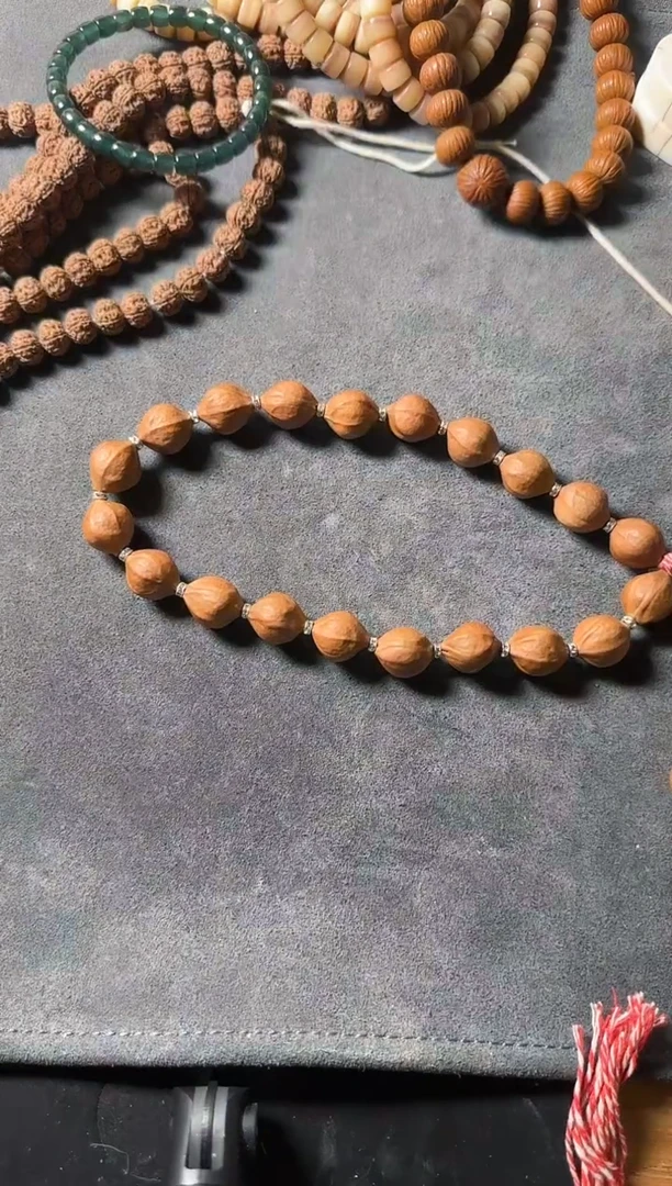 橄榄核手串瑕疵瑕疵小蜜桃 可退无补12 13左右