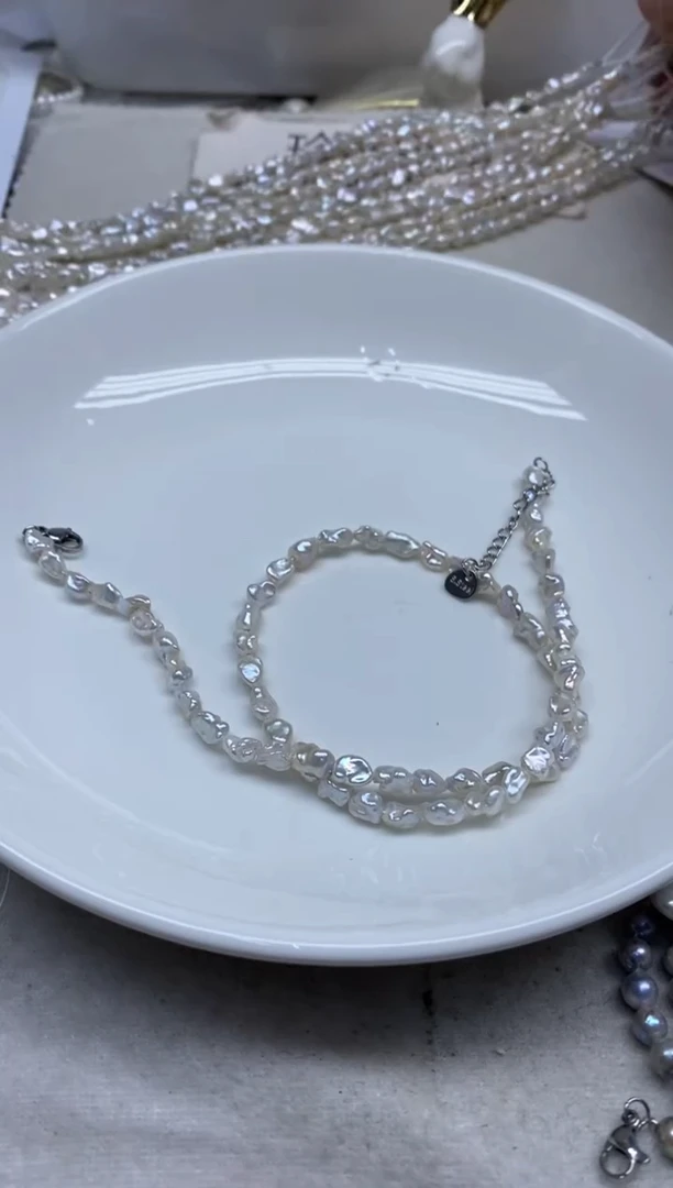 淡水珍珠钛钢颈饰碎银发1