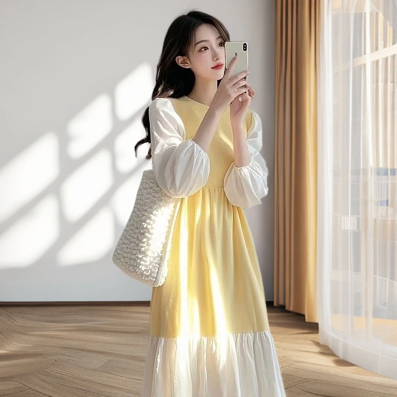 2025早秋裙子爆款显瘦收腰高级感超好看气质千金风黄色拼接连衣裙