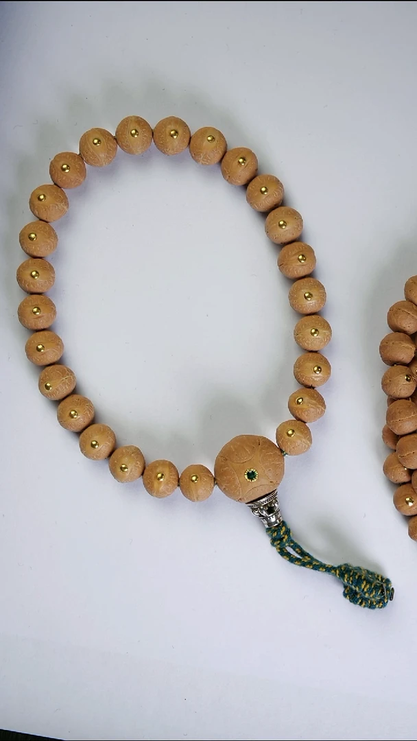 吊坠凤眼菩提精工细作 终成大器