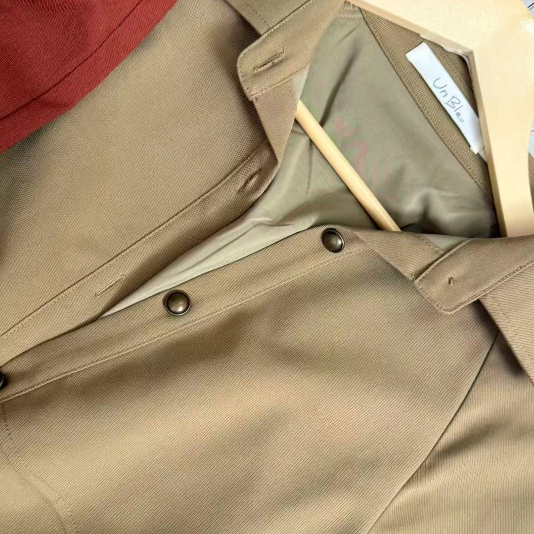 菲菲的店un拼接毛衣款风衣