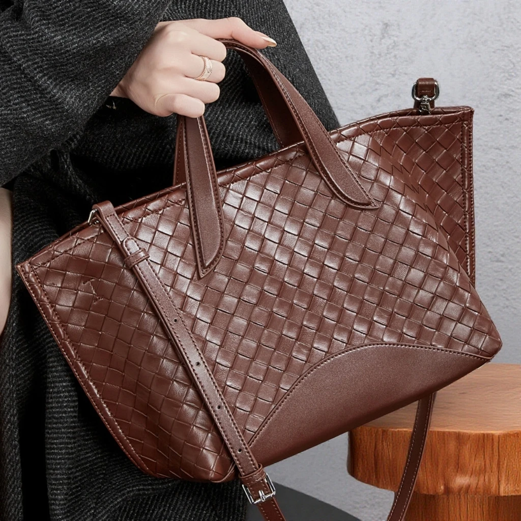 真皮小众设计编织托特包包女2025新款通勤百搭大容量手提斜跨包包