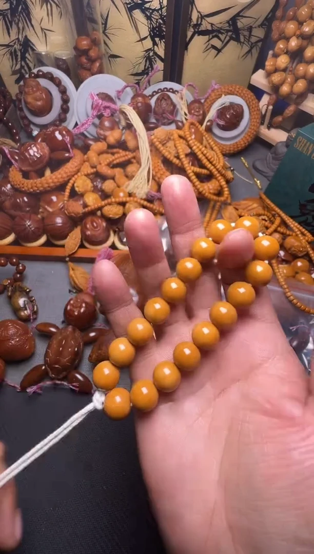 手串橄榄核M****）猴头光珠