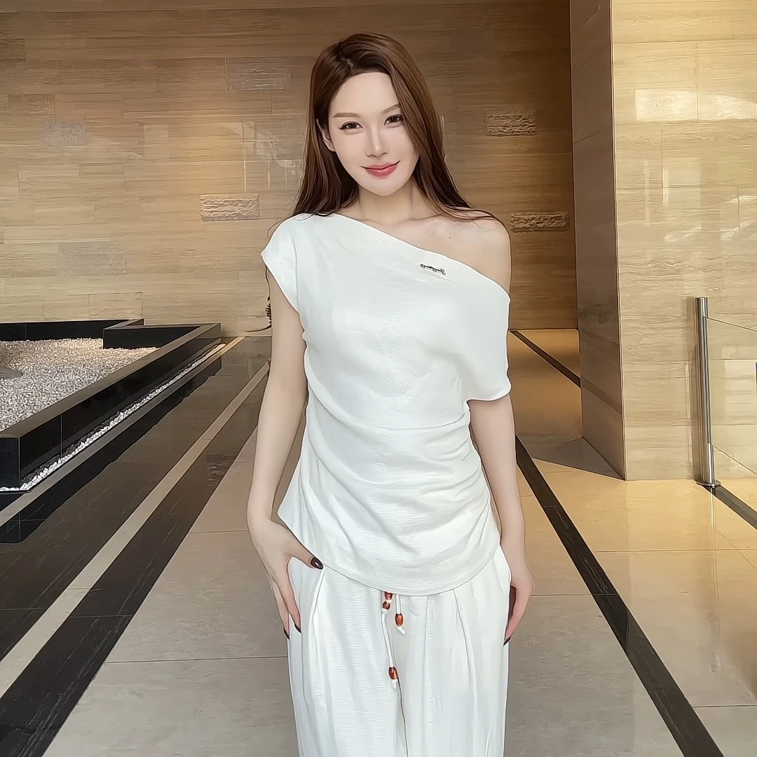 姜穹JIANGQIONG2025夏季格子棉麻斜肩腰部抽褶上衣