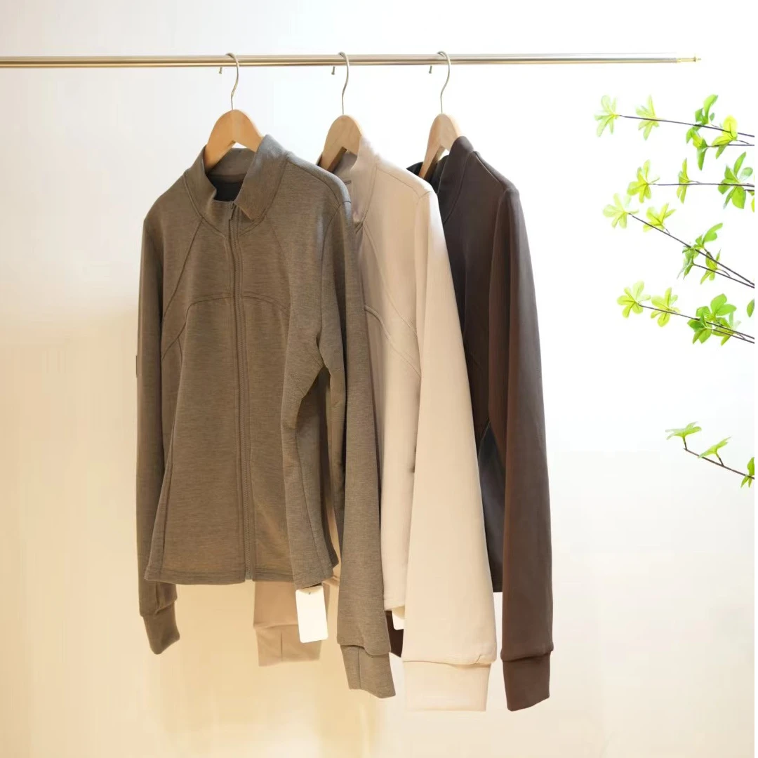 0917-一款三色拼缝方标装饰女款休闲立领外套