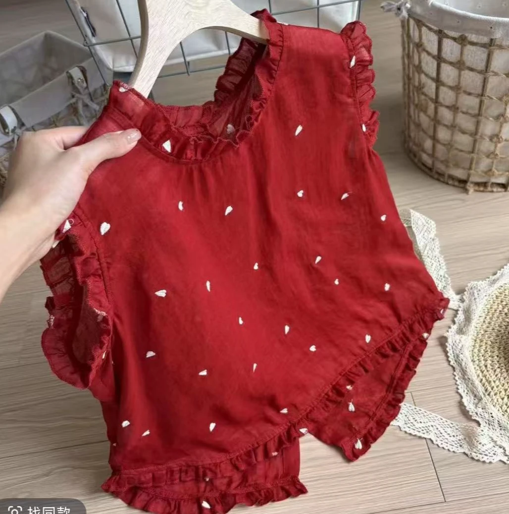 今喜韩版爱心印花木耳边衬衫女2025夏款荷叶边裙摆娃娃衫后背纽扣