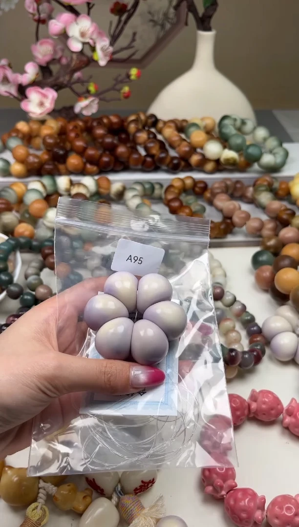 菩提根/象牙果吊坠瑕A95蒜瓣手捻23-24mm一串随机