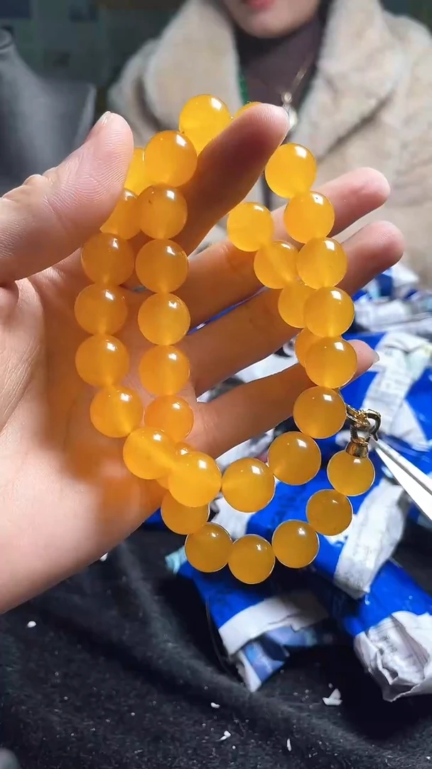 猛子收货满黄珠链
