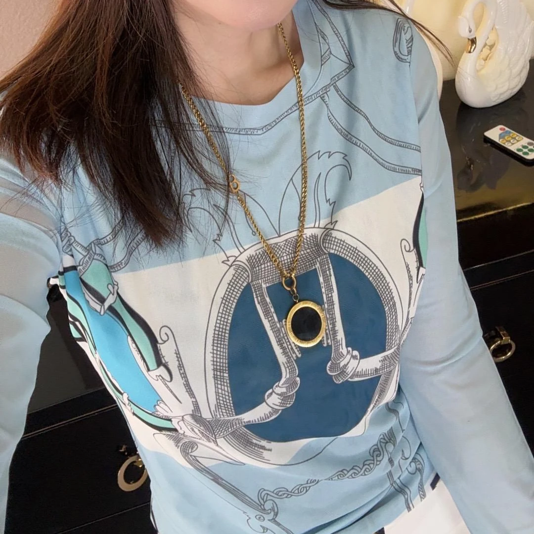 浅蓝色早春时髦气质印花网纱长袖T恤圆领设计感女打底上衣D1607#