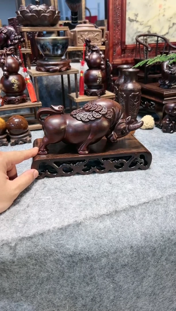 风车木（黑檀木）20公分金钱牛+22书卷底座一套