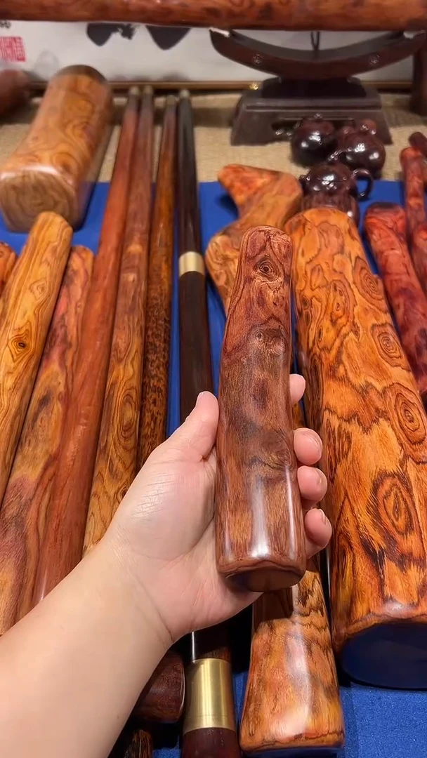 木质老挝花梨水波纹手把件长21口径2.9