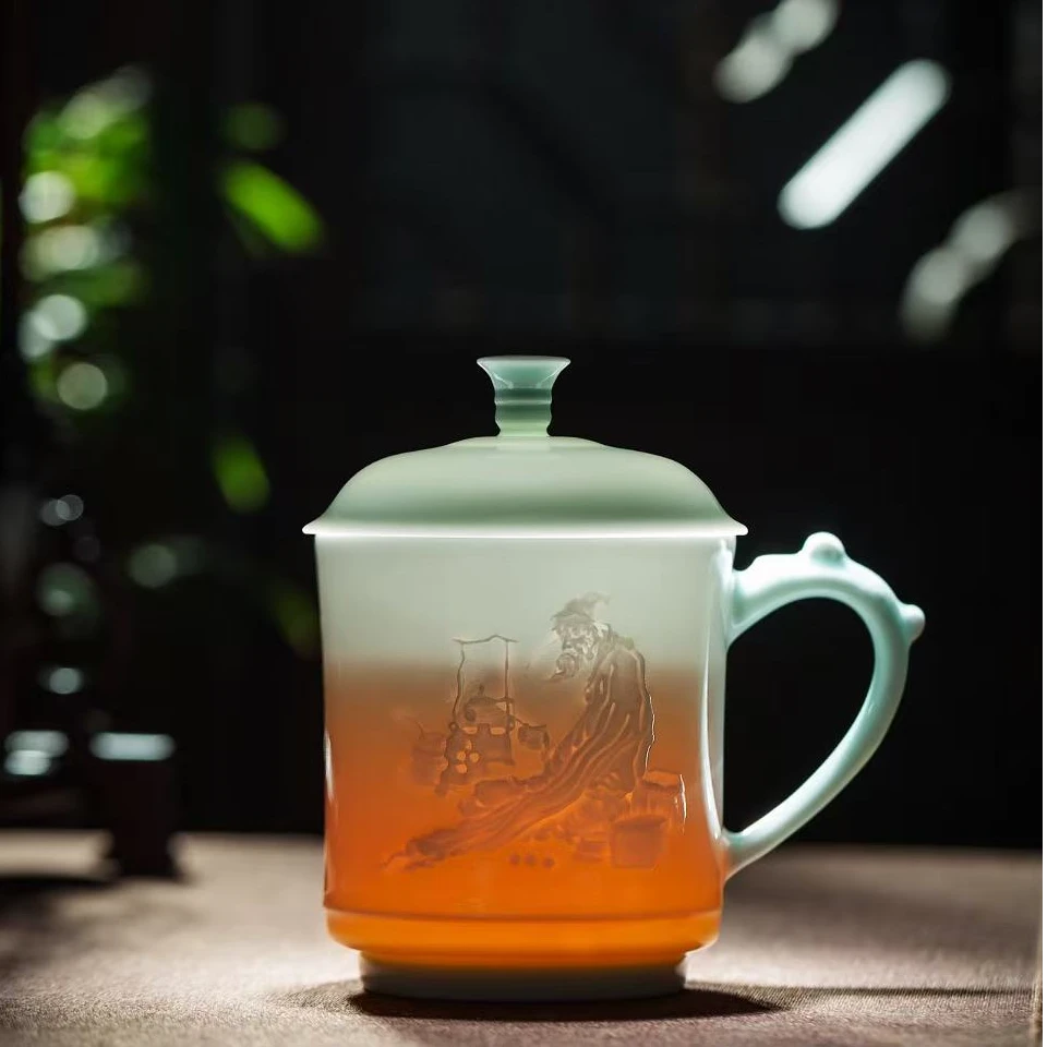 景德镇高温玉泥浮雕青釉家用办公室杯高档陶瓷茶杯带盖子纯手工