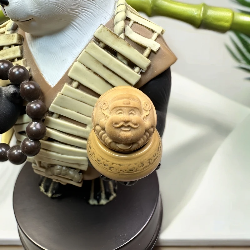 「送财童子」精工猴头核桃雕刻 孔道镶嵌猴头配饰