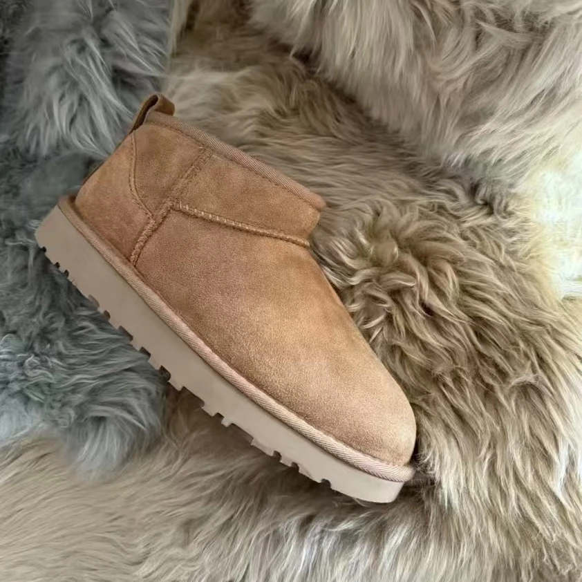 桑坡周冬雨平底雪地靴加厚时尚保暖舒适加绒皮毛一体冬季短筒