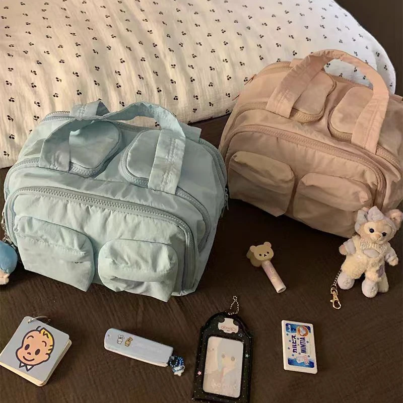 莉莉安双口袋手提化妆包新款百搭高颜值大容量外出便携分区化妆包