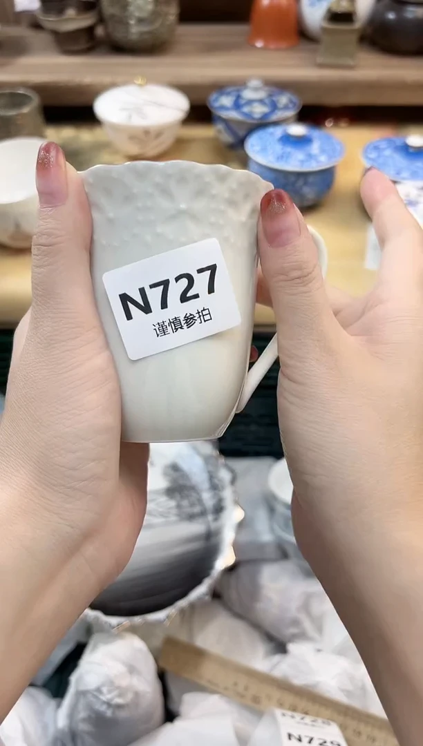 瓷片?**F 727