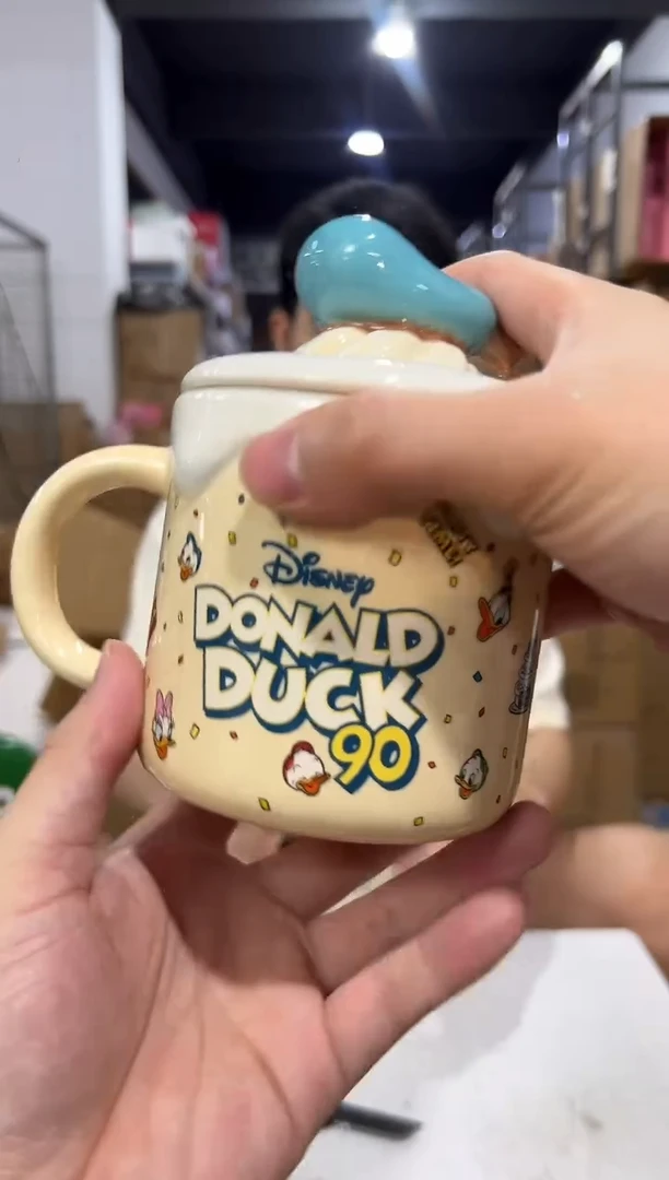 瓷片原盒90周年唐老鸭带盖杯