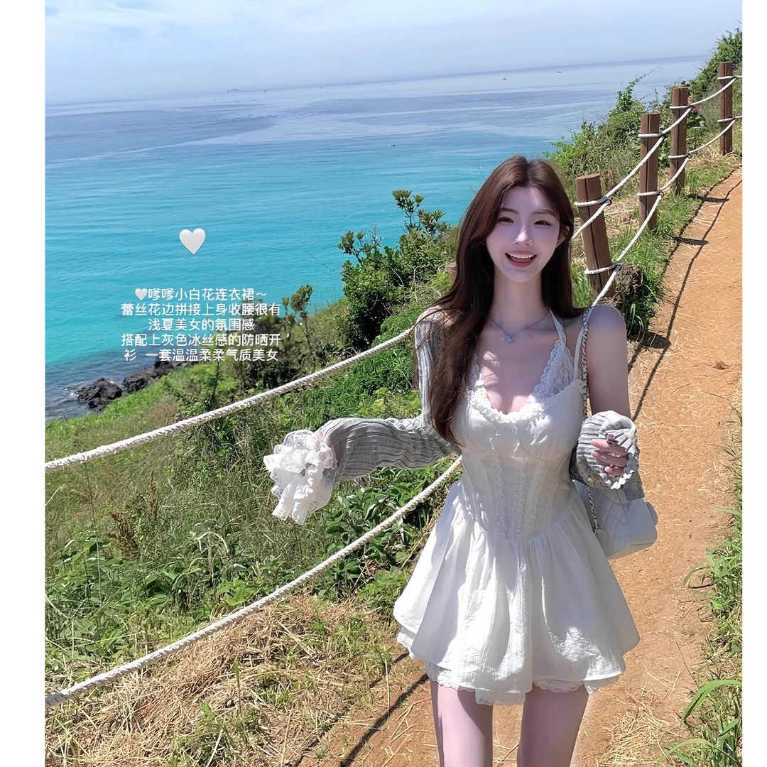 巨美蕾丝裙 假两件花边白色连衣裙女修身海边度假气质短裙