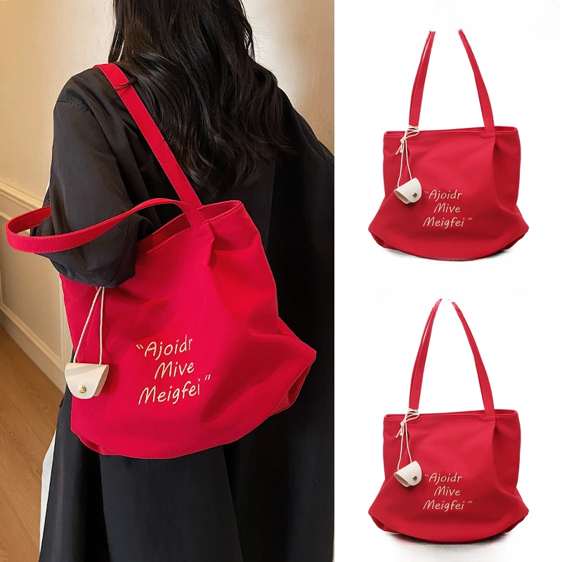 夏天大容量高级感通勤托特包包女2025新款字母印花红色帆布单肩包