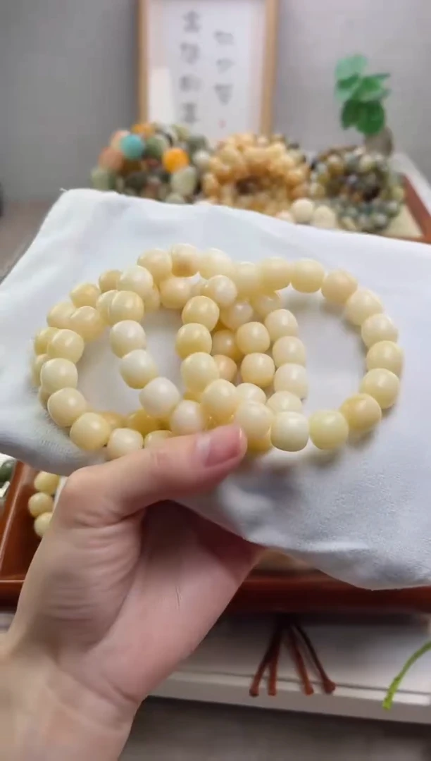 菩提根/象牙果手串奶油白雪玉化桶珠11*12瑕疵不补