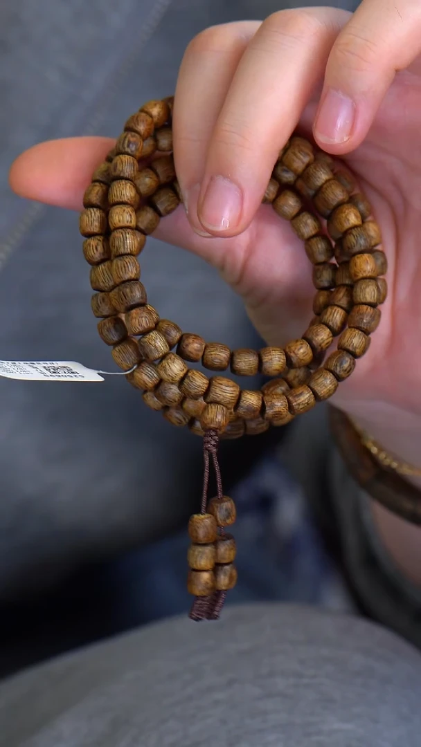 沉香手串顺纹乌身沉水浮S250695