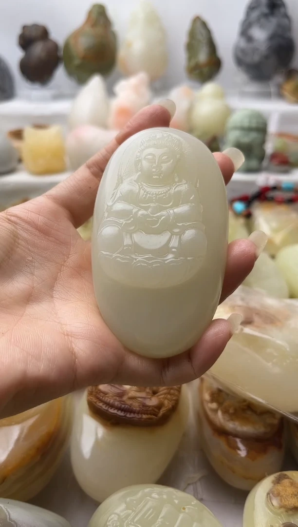 石材一**简方解石手把件不退换观音