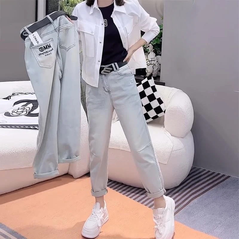 大码破洞牛仔裤女2025年新款春秋九分哈伦裤胖mm显瘦直筒老爹裤子