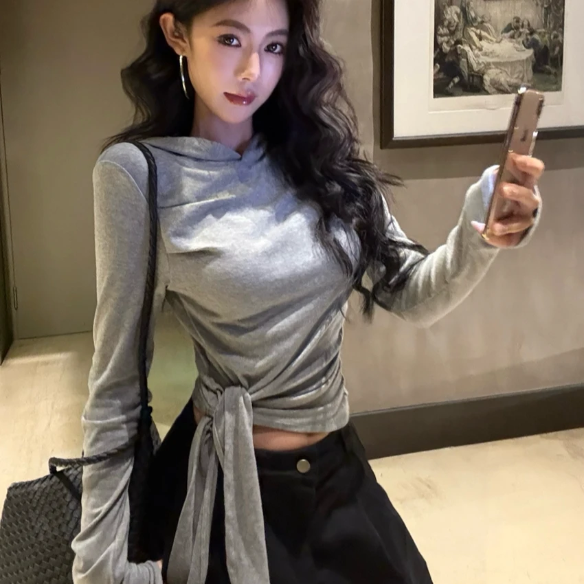 辣妹不对称绑带连帽长袖T恤女秋冬短款修身打底衫不规则小众上衣