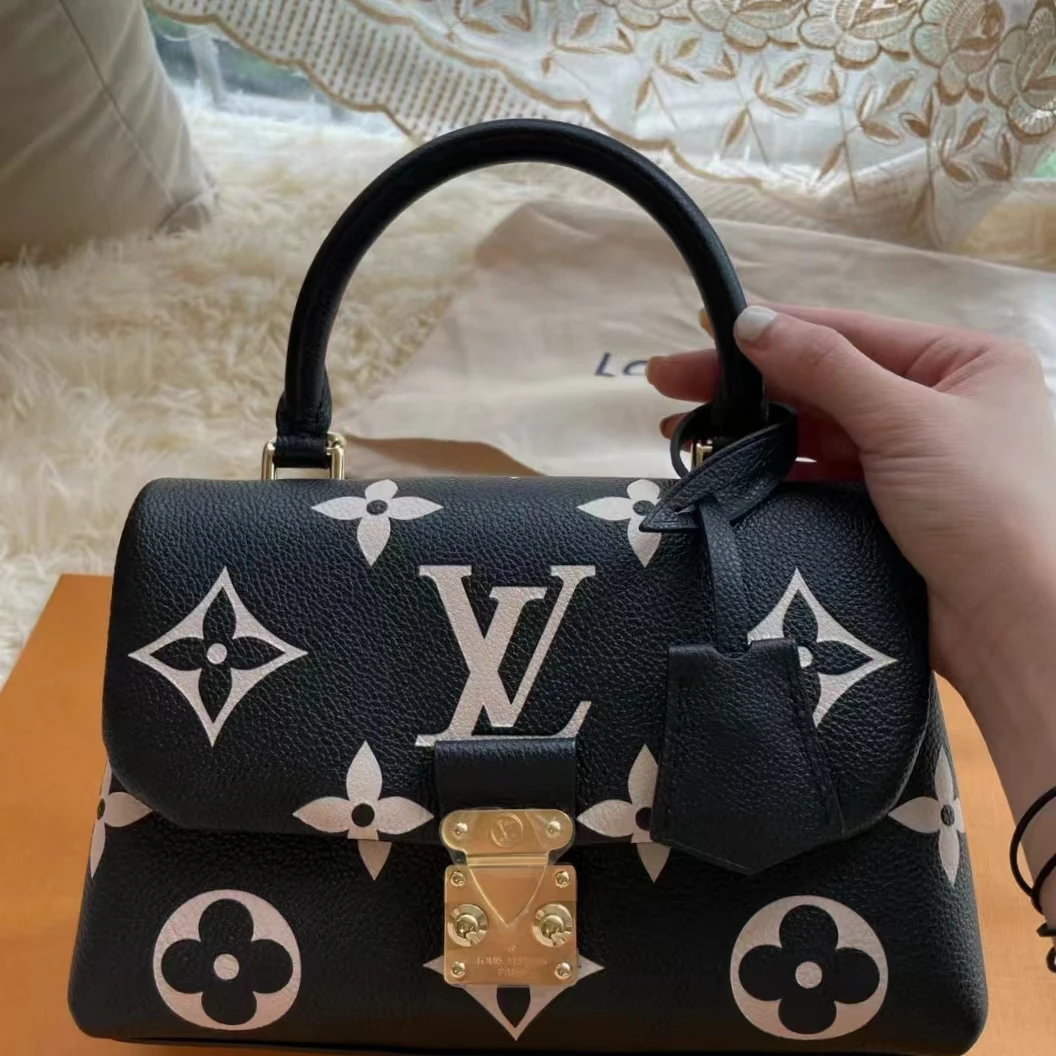 99新 LouisVuitton/路易威登 LV 玛德琳bb黑皮白花包/优品
