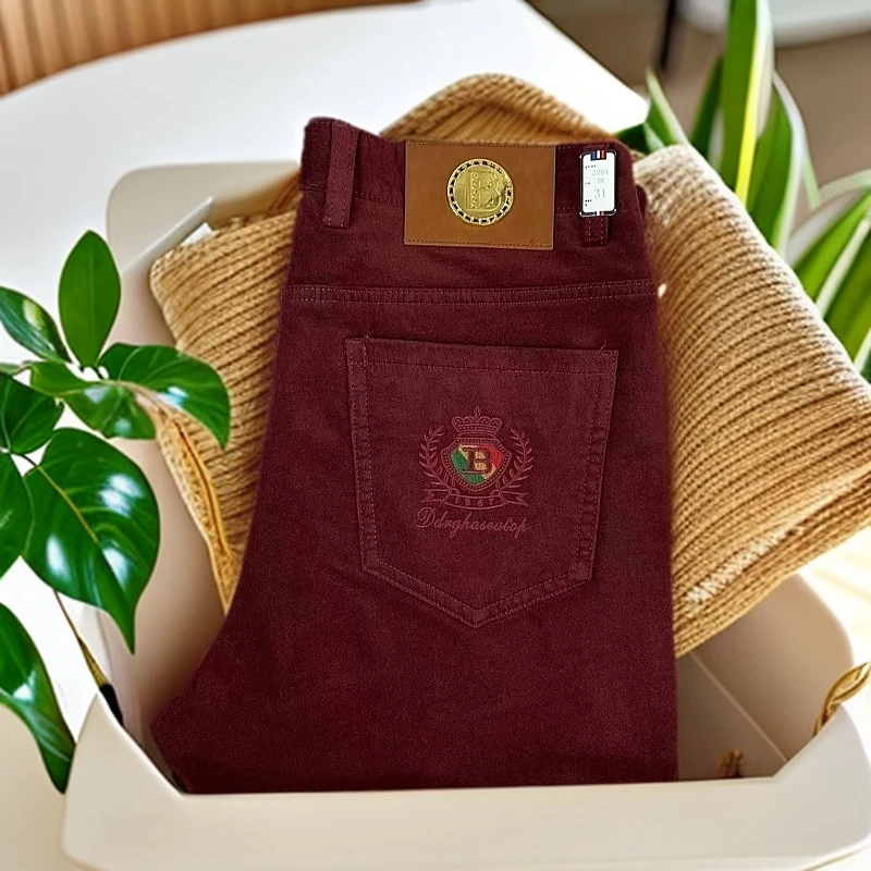 品牌高档复古男士新款潮流秋冬红色休闲裤轻奢牛仔裤男款秋冬装