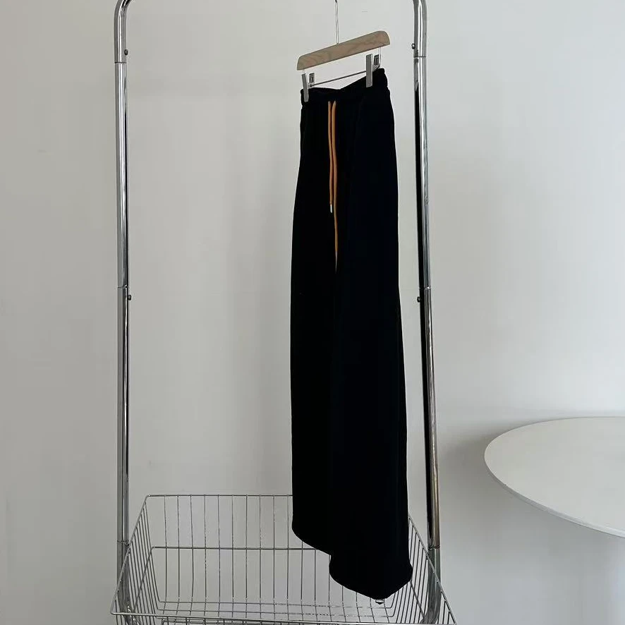 清黄色绳黑色休闲裤