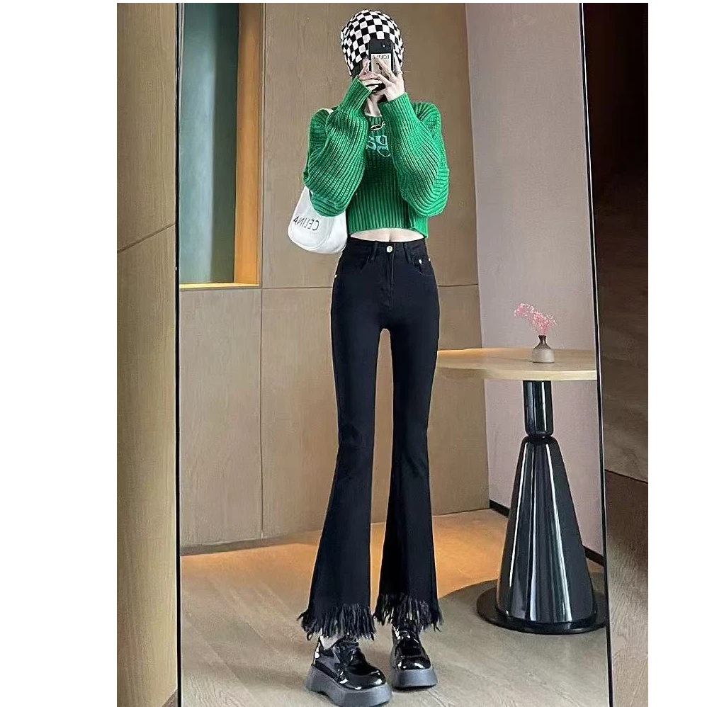 8020新款春装微喇裤女士高腰修身毛边流苏外穿2025黑色喇叭长裤子