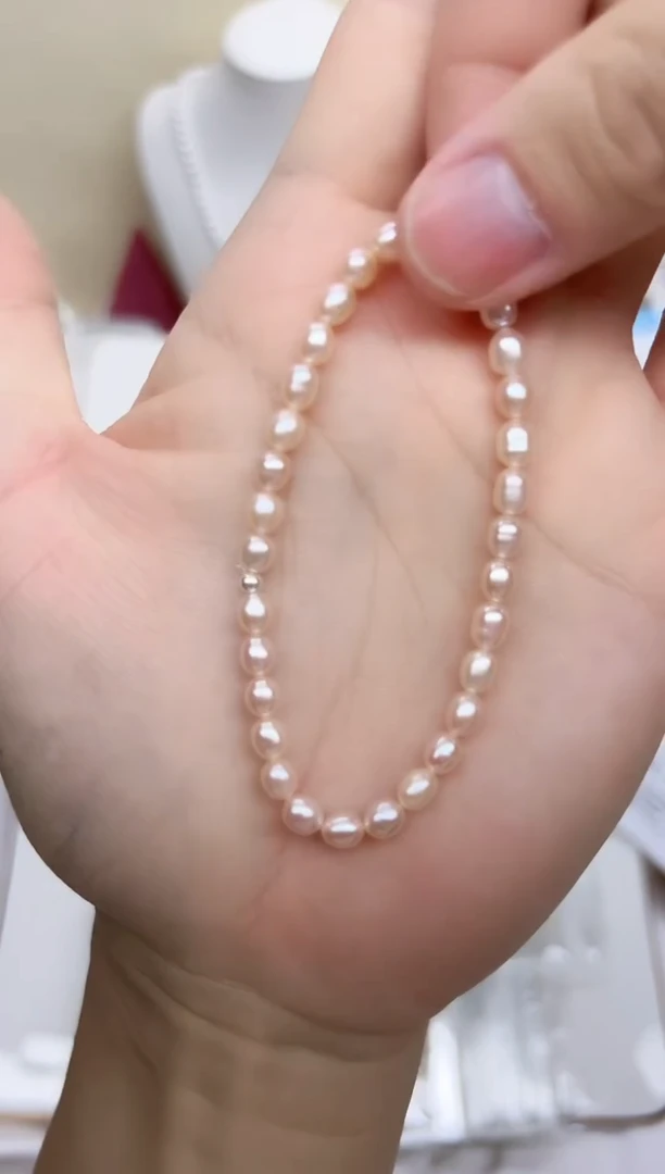 淡水珍珠手链银S925镶嵌粉色5mm （略微生长纹介意勿拍）