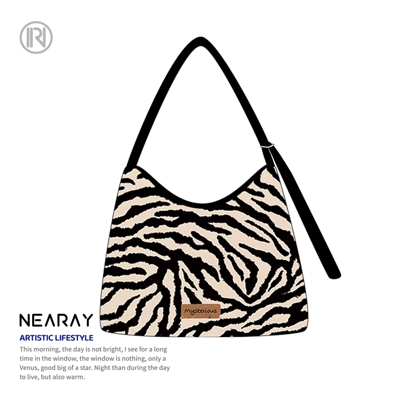 尼睿2025新款原创设计斑马纹文艺单肩包大容量帆布斜挎包女包AS