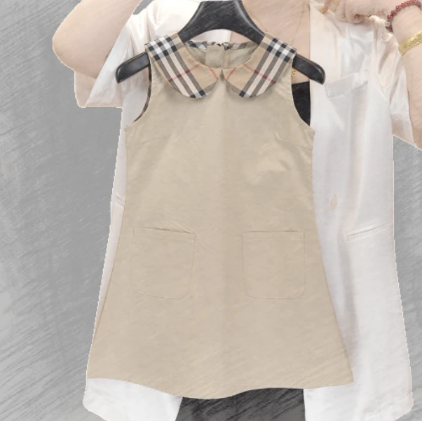 88369女童夏季新款时尚洋气轻奢大牌风经典口袋娃娃领无袖连衣裙