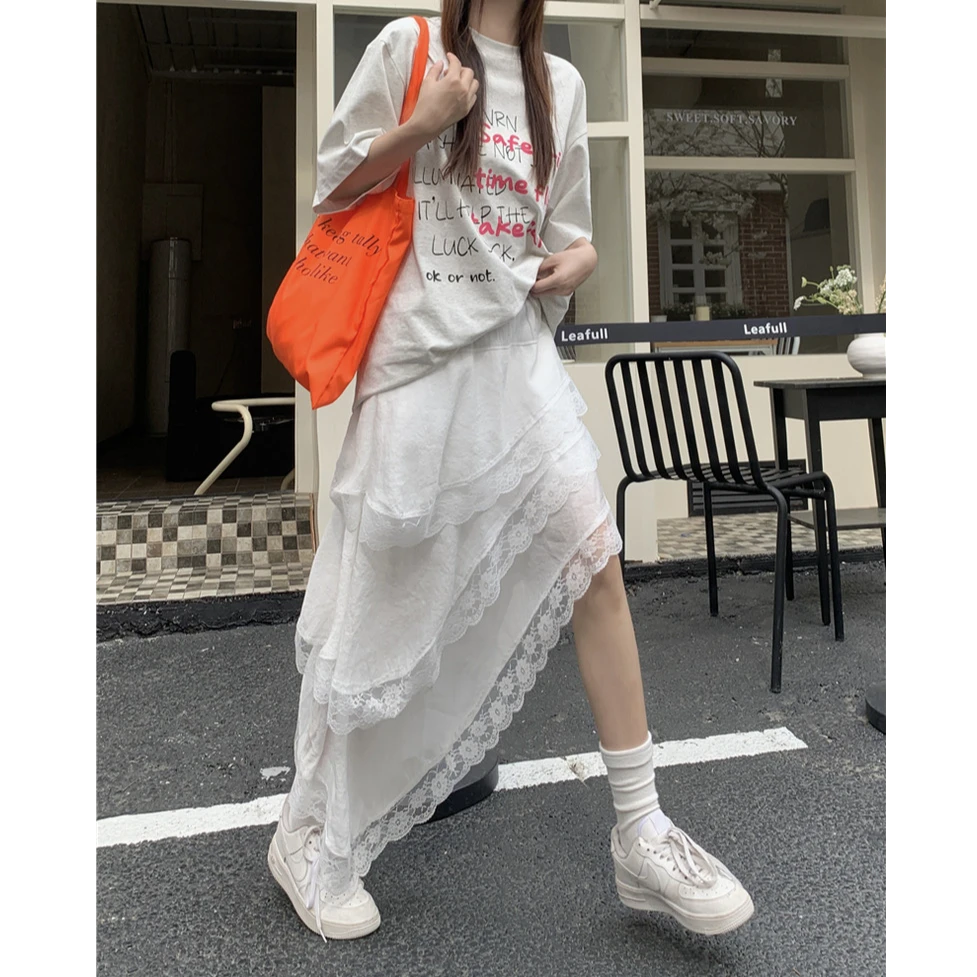 蕾丝拼接不规则A字长裙女春季2025新款复古松紧腰显瘦纯色半身裙