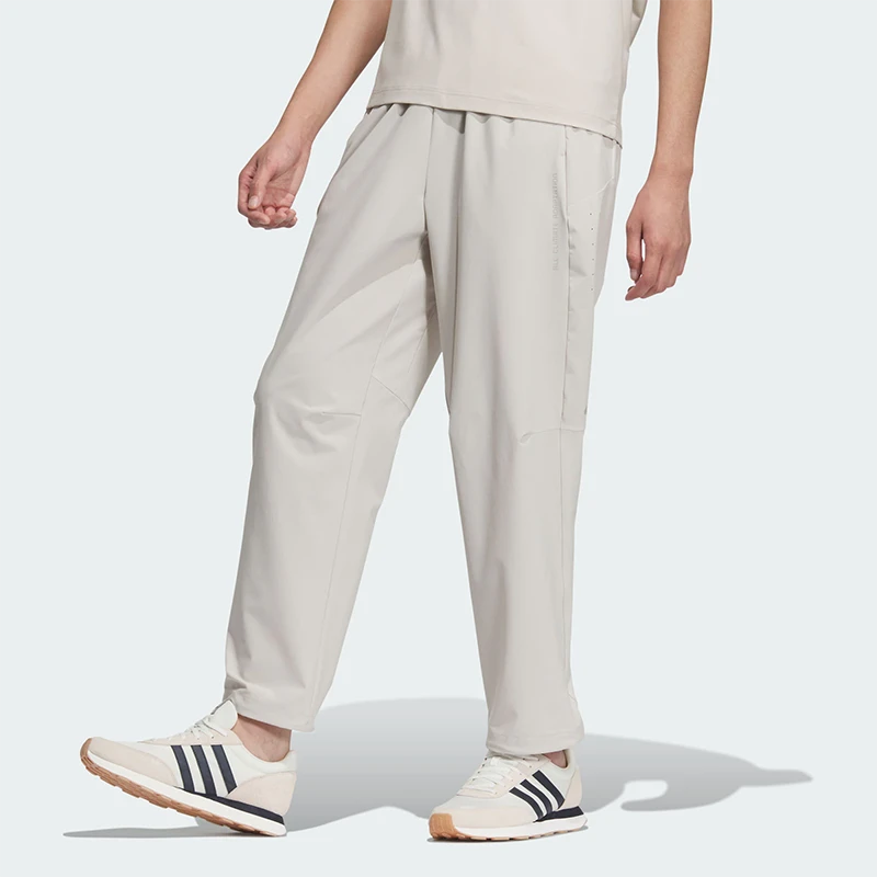 Adidas阿迪达斯男裤2025夏季新款梭织防风透气收口运动长裤JZ8398