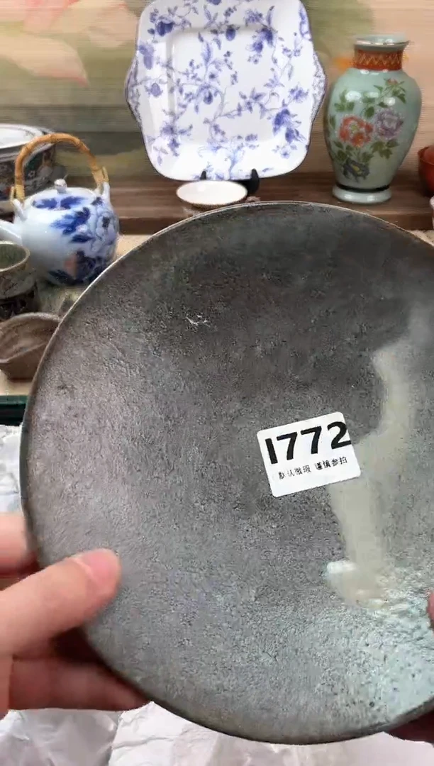 瓷片你***谁772