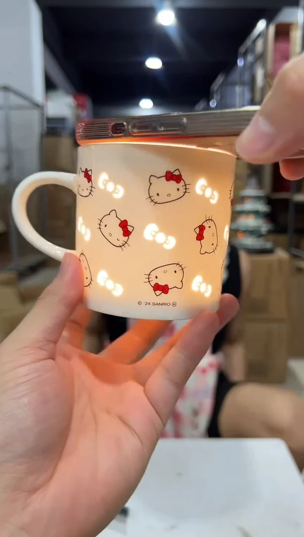 瓷片白色kt猫缕空满印水杯