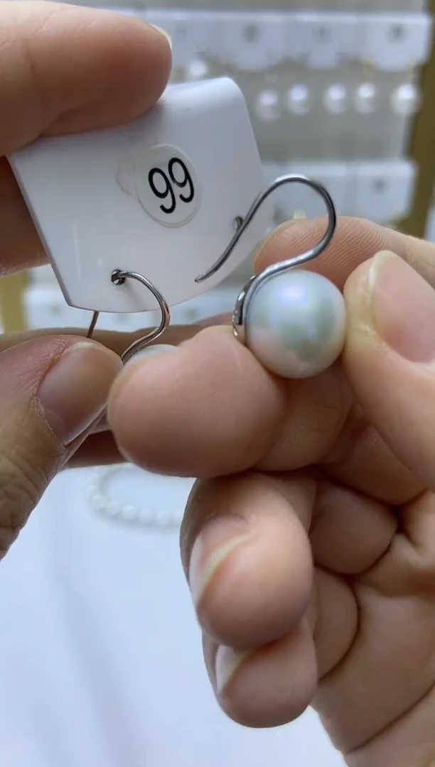 银S925镶嵌耳饰淡水珍珠99