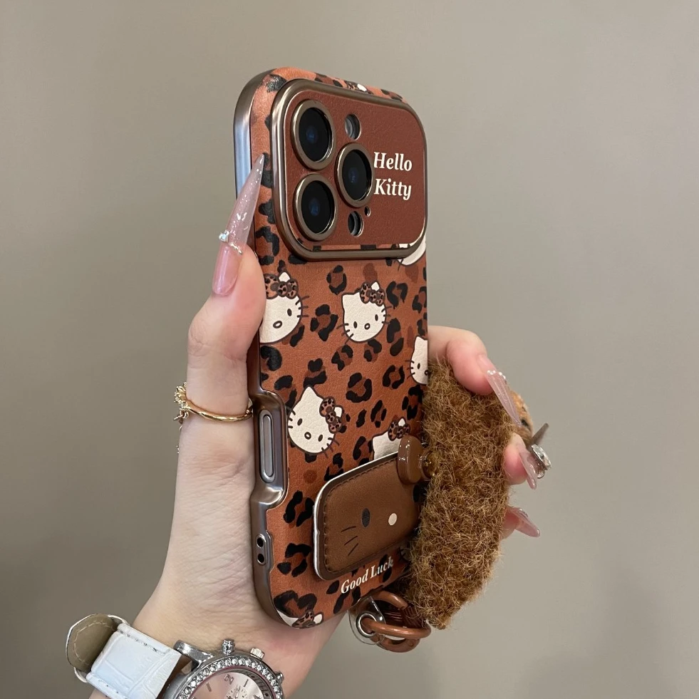 柒家棕底豹纹KT猫毛绒挂绳适用17promax手机壳16新15pro秋冬14pm