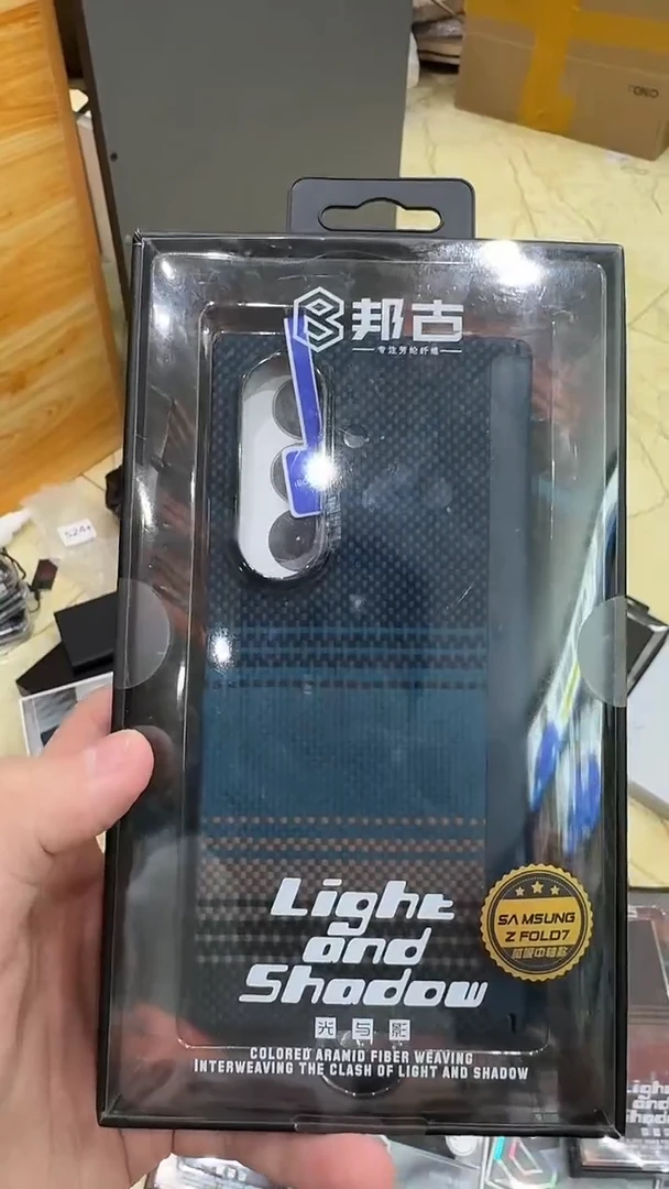 99新盛****家f7  黑蓝款超薄磁吸凯夫拉