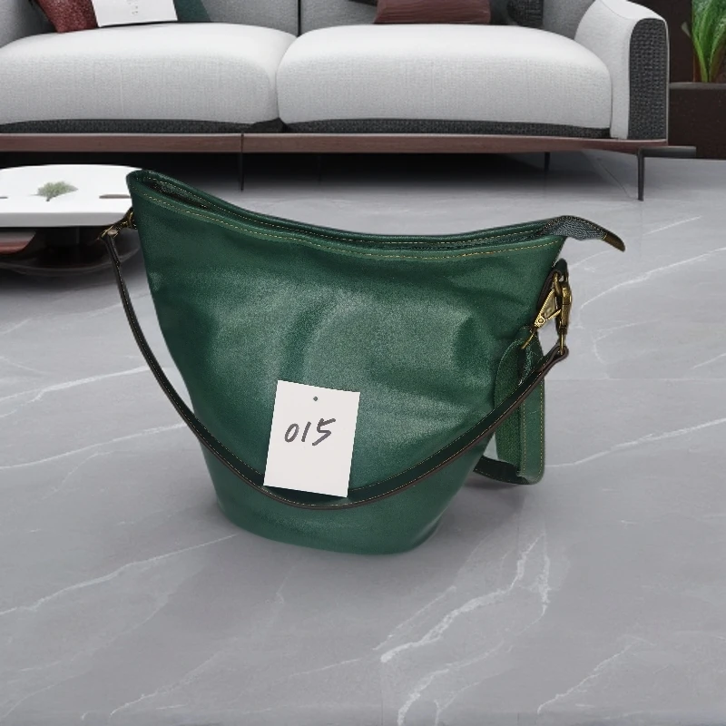 时尚潮流牛皮斜挎单肩大水桶女包底长22高27袋口30侧16厘米