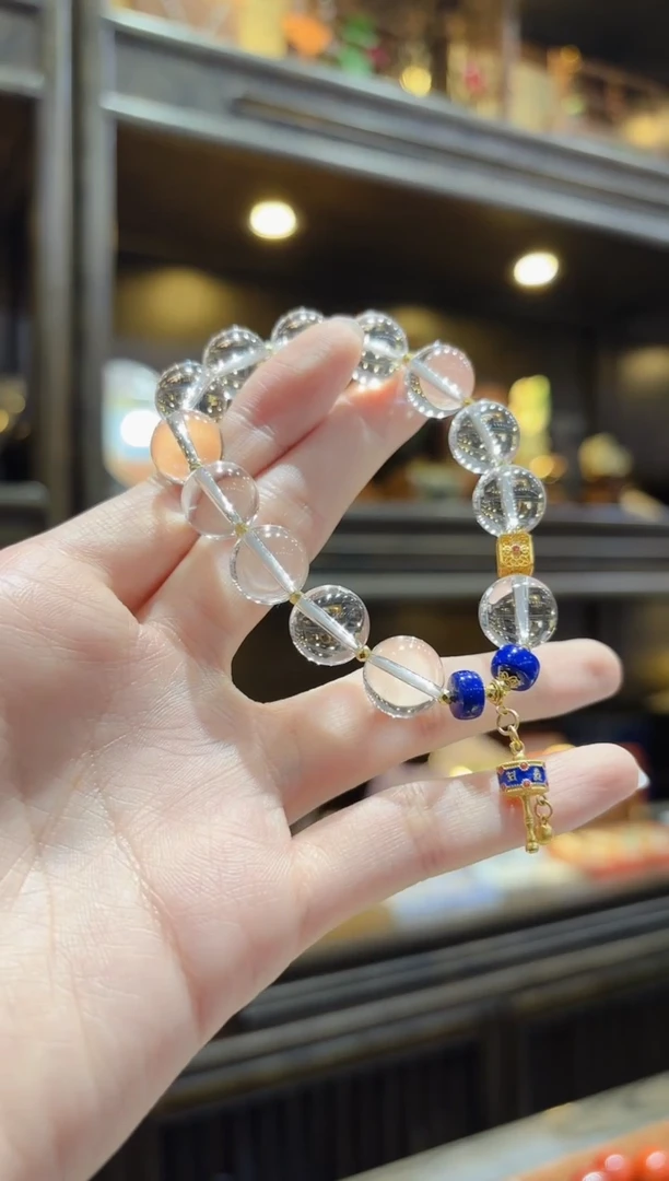 【闪购商品】水晶手串18K金镶嵌蓝转经筒提溜白水晶手串