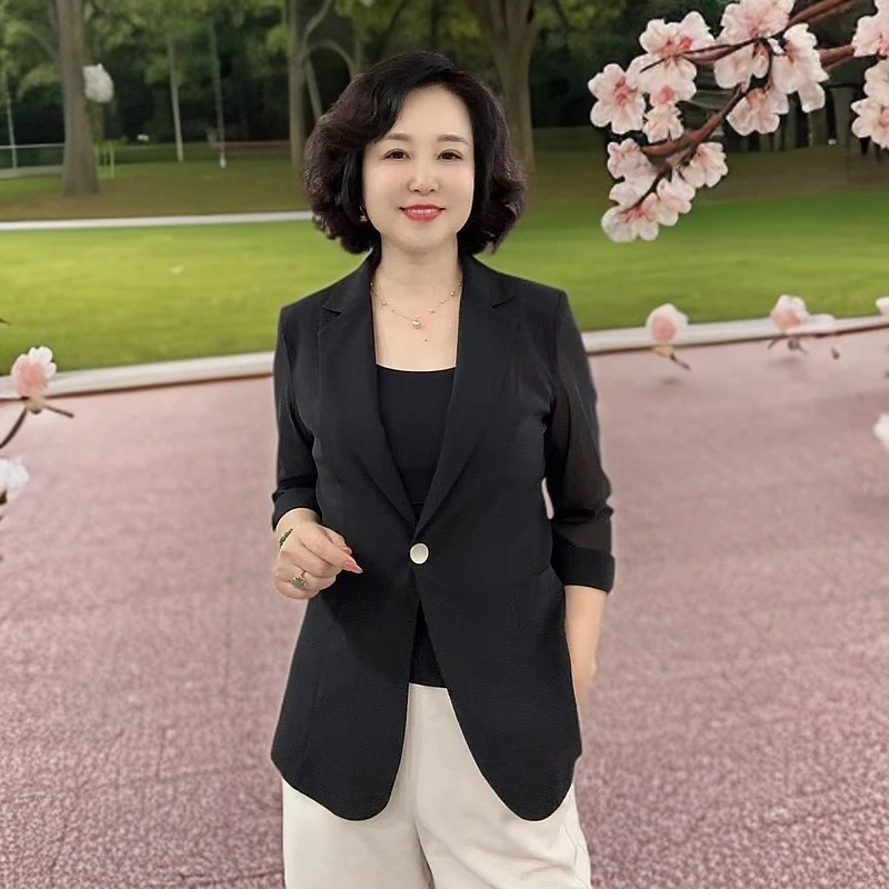 118七分袖黑色网纱西服，前长65cm左右，有弹力舒服