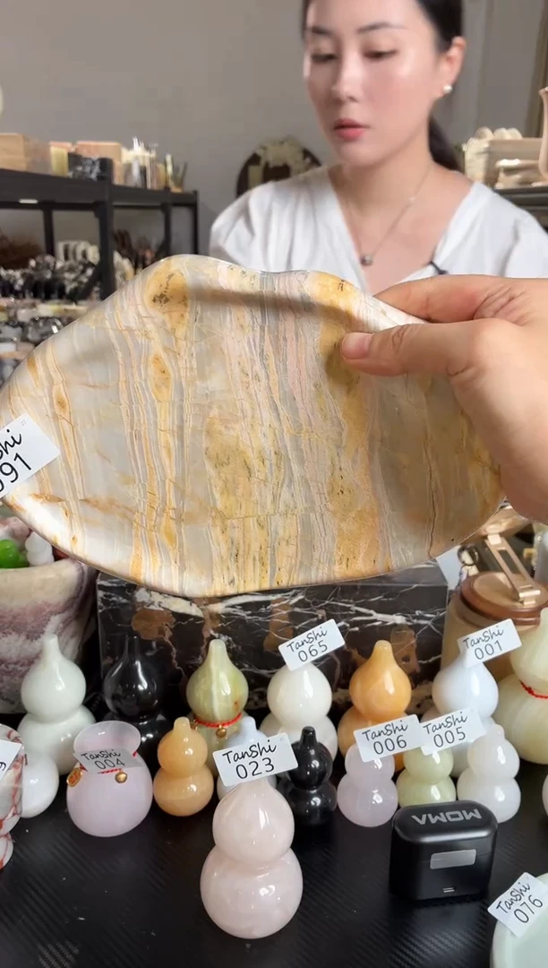 石材091金孔雀云朵盘水磨