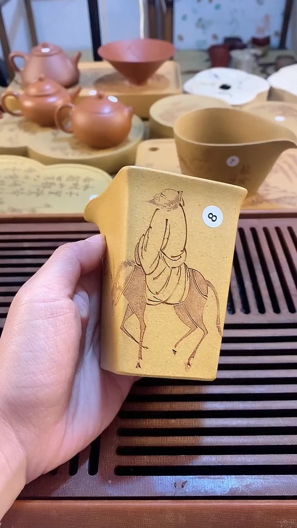 紫砂欢喜自在公道杯