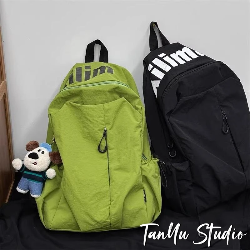 探屿潮牌小众书包女轻便防泼水休闲背包大容量运动户外旅行双肩包