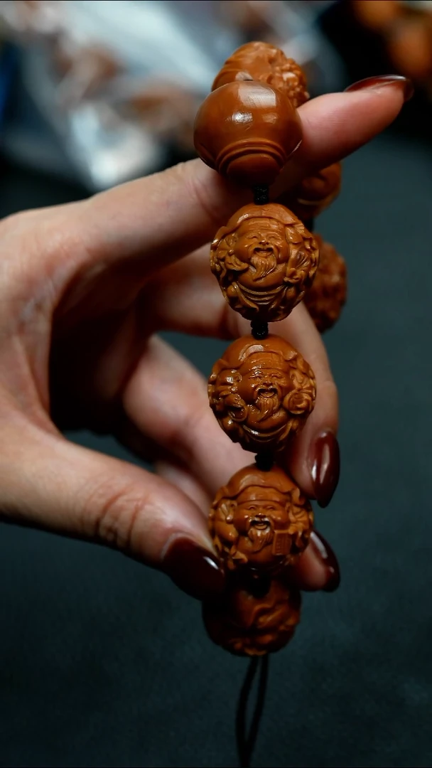 吊坠橄榄核heyicaishen