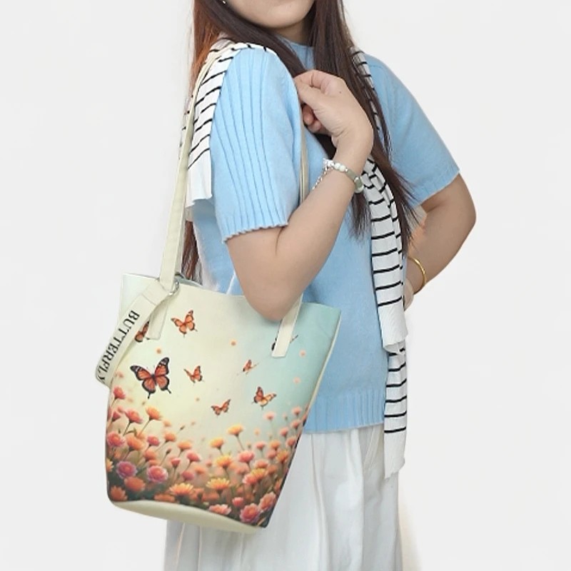 艺术鸭2025新款蝴蝶油画风单肩包小众百搭手提斜挎水桶包包女包